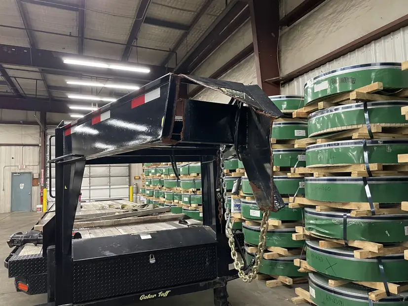 Gooseneck flatbed trailer in the shop, in from Bedford