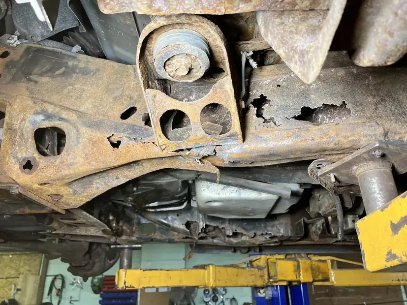 Frame rail repair on the lift at our Cleveland shop