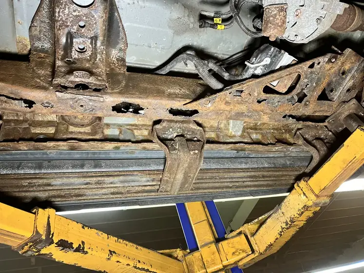 Vehicle underbody on the lift during frame work