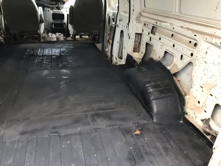 Van floor stripped back for panel work