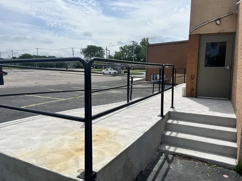 Steel railing fabricated in the shop and installed on site