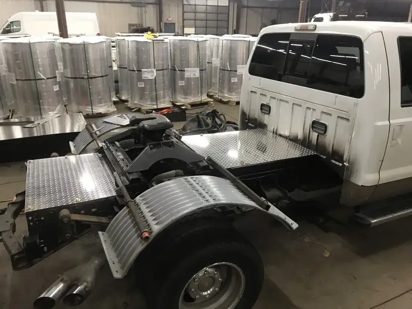 Truck chassis with a fabricated bed frame in progress