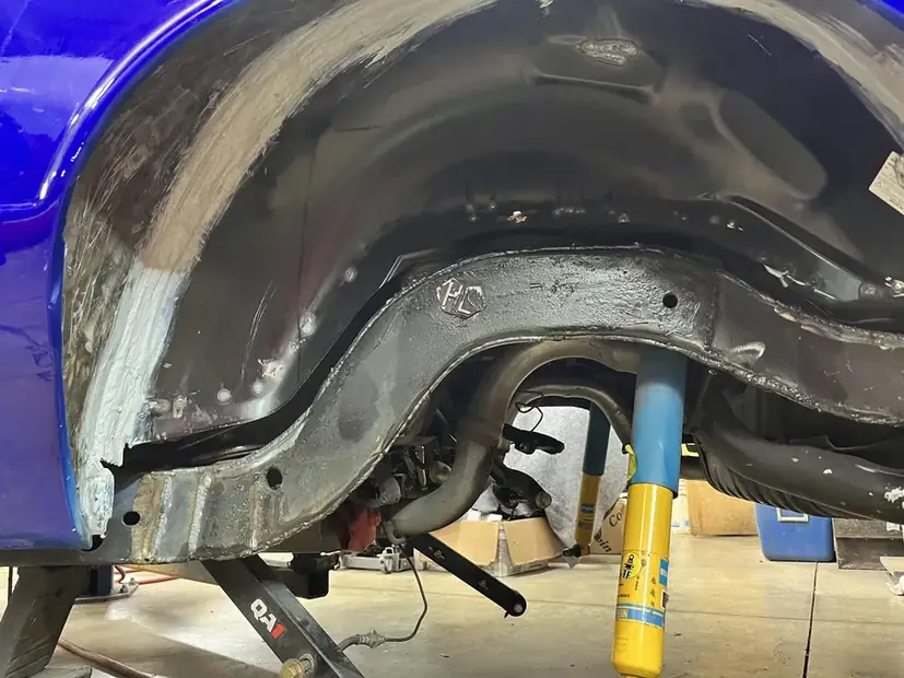 Wheel arch notched and rebuilt for clearance