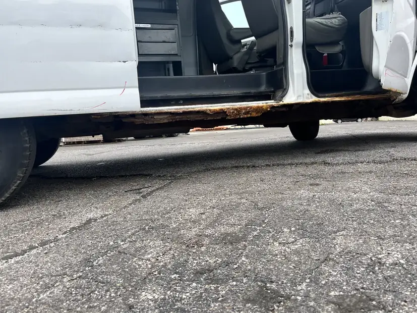 Door bottom and sill area before repair