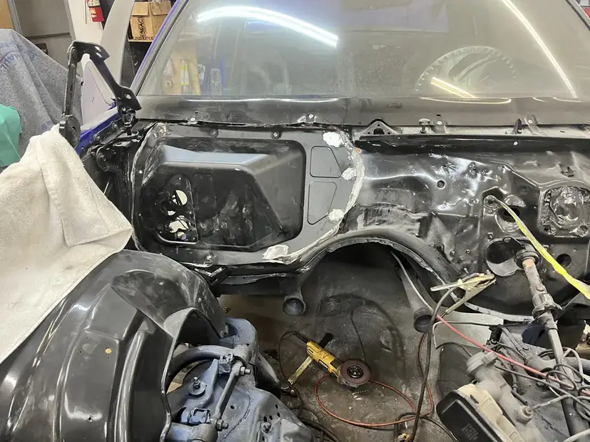 Engine bay stripped for metalwork