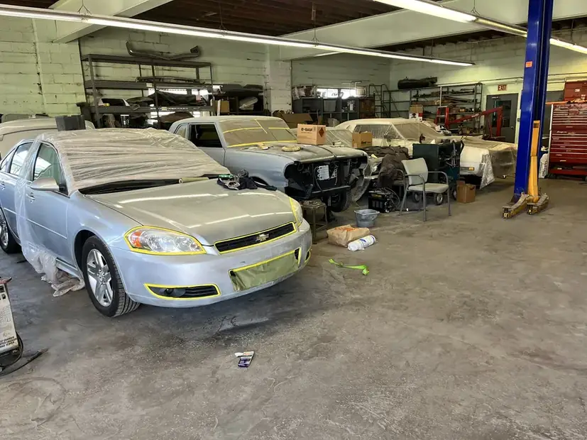 Vehicle in the shop after metalwork, before paint