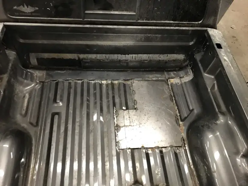Truck bed floor repaired and refinished