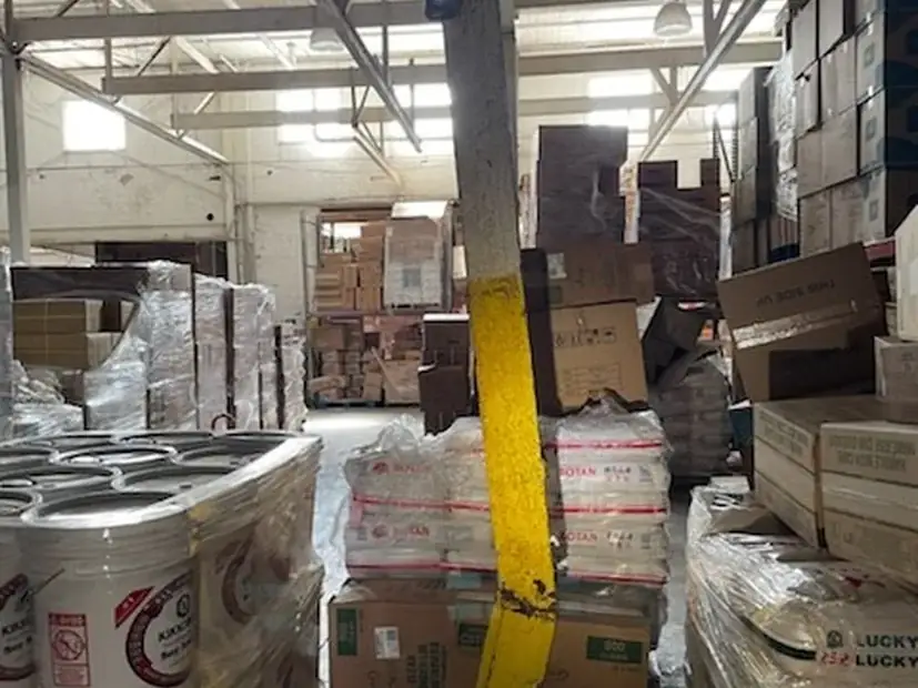 Steel post in a warehouse during structural work