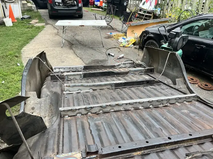 Damaged bed side before repair