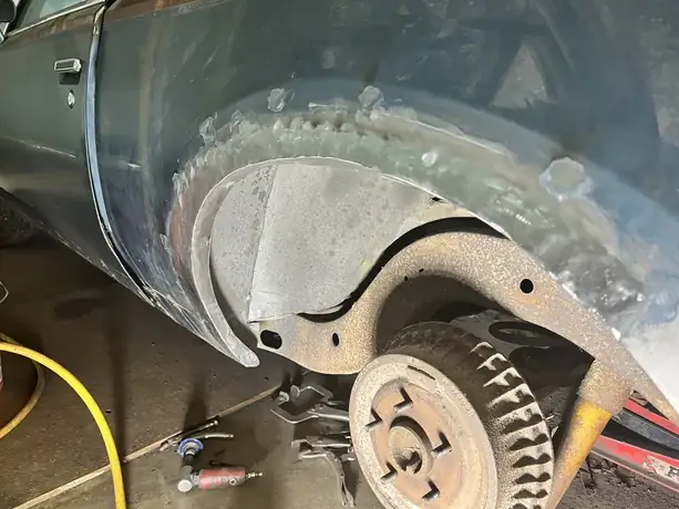Wheel arch cut back and patched